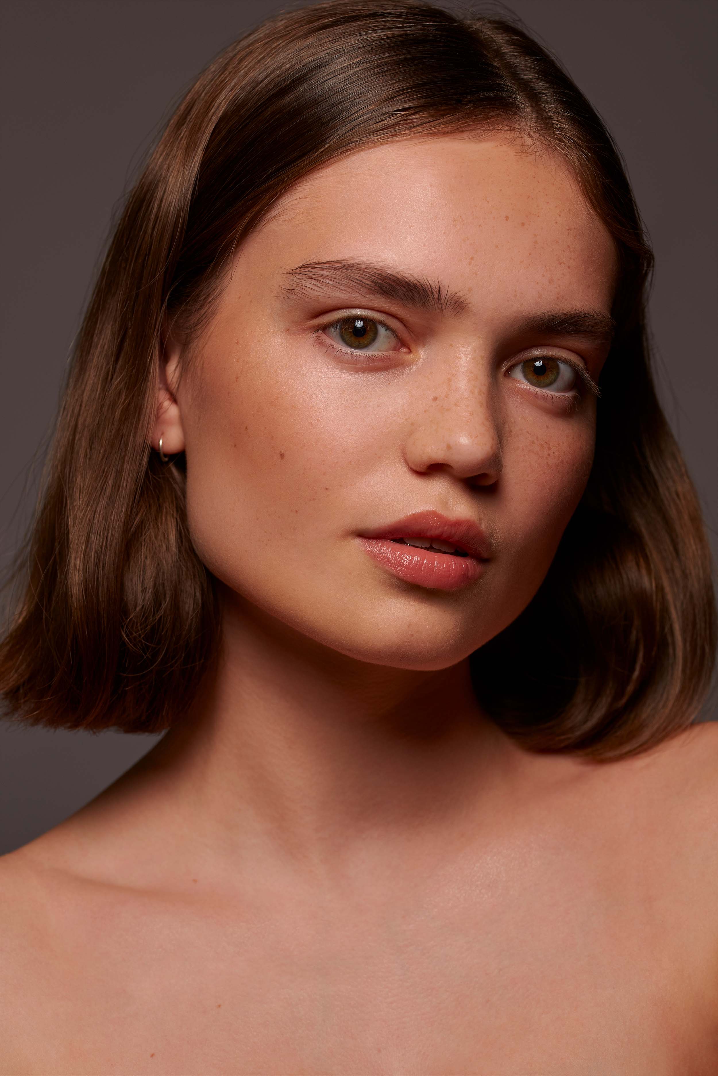Portrait photography - natural lighting with refined composition and professional styling